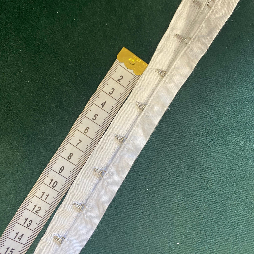 Hook and Eye tape , white , silver metal hooks,